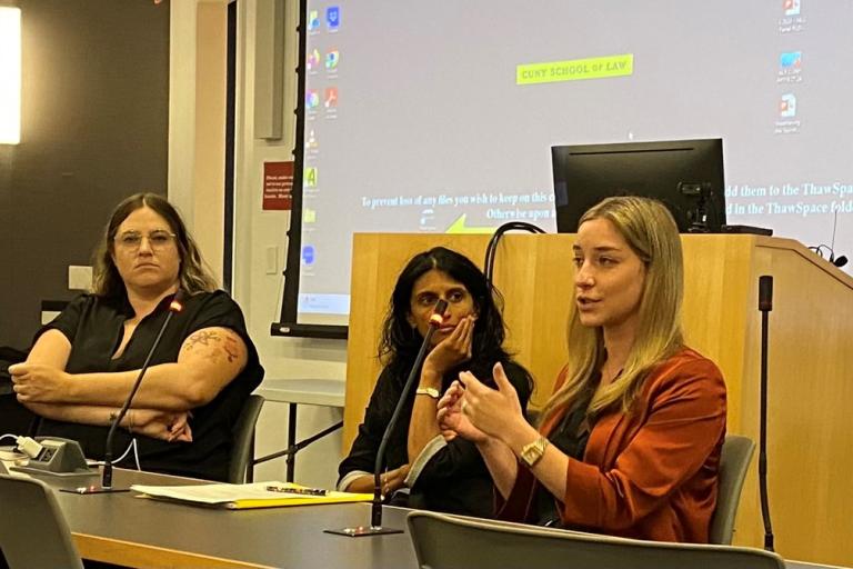 Women talking at panel